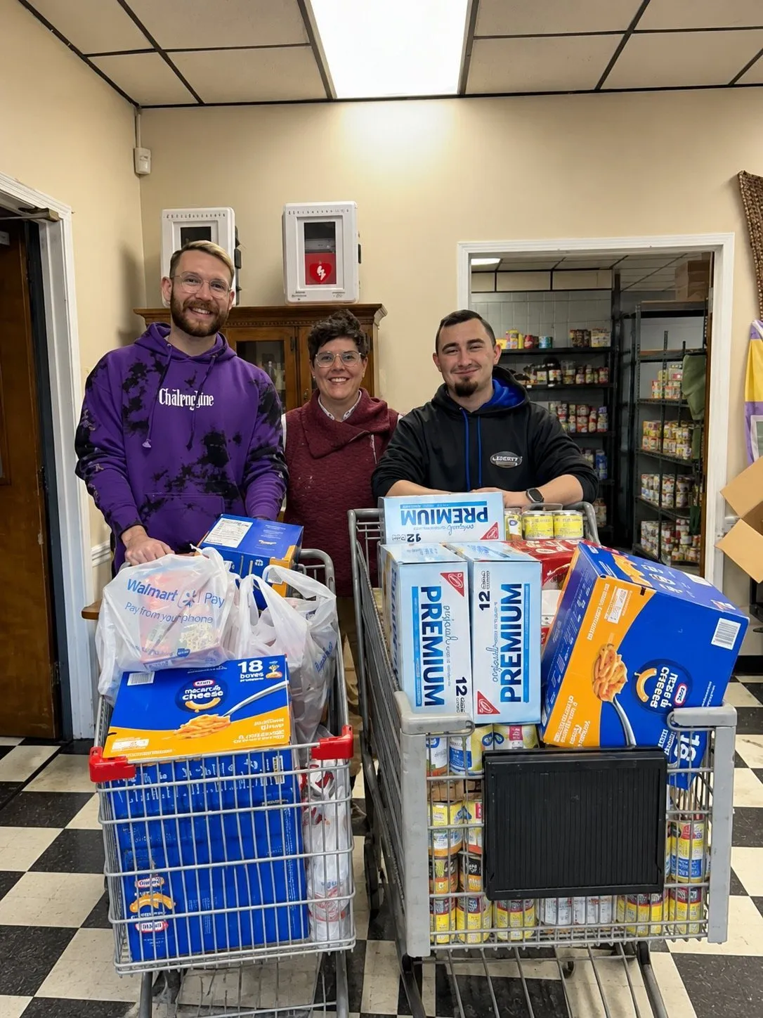 John Stopka and two others with shopping carts of donated food at Paducah Cooperative Ministry
